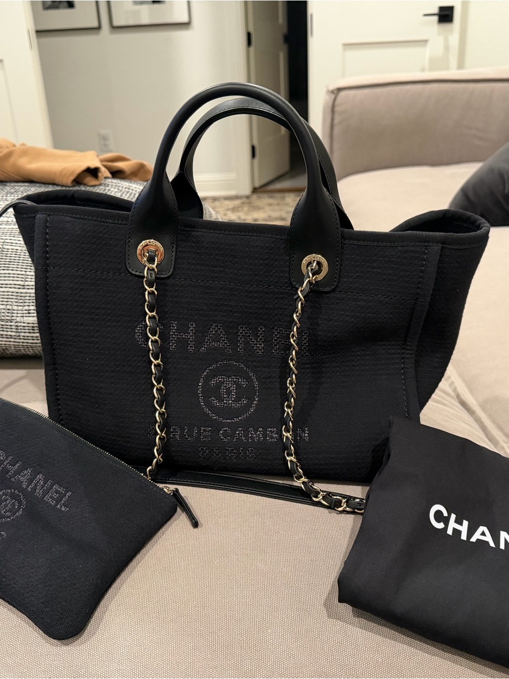 CHANEL Black Canvas Tote with Leather Handles and Gold Chain Accents - Picture 4 of 14